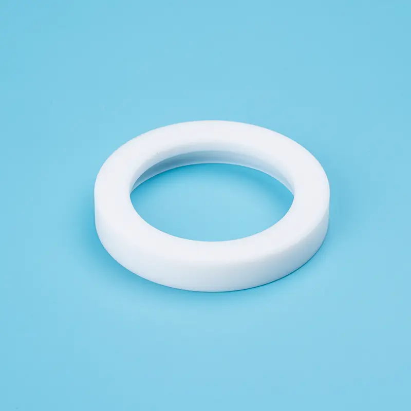 PTFE persely